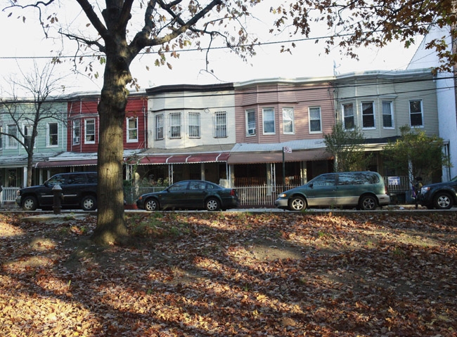 A row of houses facing the river